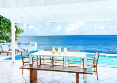 Splendid waterfront villa 4 bedroom 4 baths private pool overlooking the Caribbean sunset also available for weekly rental - amazing investment